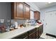 Functional kitchen featuring ample countertop space and wooden cabinetry for storage at 2921 Bon Air Dr, Orlando, FL 32818