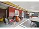 Covered patio with grill, seating, and various decorative items at 2921 Bon Air Dr, Orlando, FL 32818