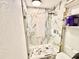 Modern bathroom featuring a stylish glass-enclosed shower with sleek fixtures and elegant tile work at 2932 Larson St, Kissimmee, FL 34741