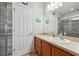 Well-lit bathroom with a modern walk-in shower and stylish vanity at 2950 Inca Ave, Clermont, FL 34715