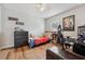 Cozy bedroom featuring hardwood floors, natural light, and plenty of space at 2950 Inca Ave, Clermont, FL 34715