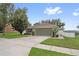 Lovely home with a spacious driveway and well-maintained landscaping, located near community amenities at 2950 Inca Ave, Clermont, FL 34715