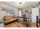 Inviting home office featuring wood-look floors and accent wall at 2950 Inca Ave, Clermont, FL 34715