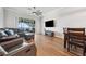 Spacious living room with wood floors and lots of seating at 2950 Inca Ave, Clermont, FL 34715