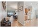 Open-concept living space featuring hardwood floors, dining area, and a view of the outdoors at 2950 Inca Ave, Clermont, FL 34715