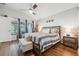 Relaxing main bedroom with natural light, and hardwood floors at 2950 Inca Ave, Clermont, FL 34715