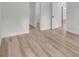 Empty bedroom featuring wood floors and doorways at 357 Marion Oaks Pass, Ocala, FL 34473