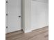 Hallway features new floors, clean lines, and bright trim and door frames at 357 Marion Oaks Pass, Ocala, FL 34473
