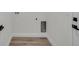 Laundry room featuring modern flooring and utility connections at 357 Marion Oaks Pass, Ocala, FL 34473