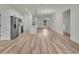 Bright, open living space featuring modern stainless steel appliances, an island, and sleek floors at 357 Marion Oaks Pass, Ocala, FL 34473