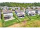 Aerial view of a home with a fenced backyard, covered patio, and proximity to wooded areas at 3961 Crawley Down Loop, Sanford, FL 32773