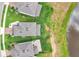 Overhead view of home's roof, landscaping and layout with lake behind property at 3961 Crawley Down Loop, Sanford, FL 32773