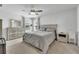 Comfortable bedroom with neutral tones, soft carpet, and natural light at 3961 Crawley Down Loop, Sanford, FL 32773