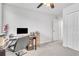 Office space in the bedroom with large desk and natural lighting at 3961 Crawley Down Loop, Sanford, FL 32773