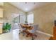 Charming dining area with backyard views, perfect for casual meals and gatherings at 4218 Inwood Landing Dr, Orlando, FL 32812