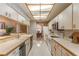 Bright, spacious kitchen with stainless steel appliances and ample counter space for cooking at 4218 Inwood Landing Dr, Orlando, FL 32812