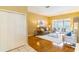 Comfortable living room with hardwood floors and a view of the backyard pool at 4218 Inwood Landing Dr, Orlando, FL 32812