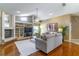 Cozy living room with a fireplace and custom built-in shelving at 4218 Inwood Landing Dr, Orlando, FL 32812