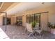 Covered patio with brick flooring, ceiling fans, and a table with chairs at 4218 Inwood Landing Dr, Orlando, FL 32812