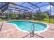Enjoy this inviting screened-in pool with sunny skies, perfect for swimming and outdoor relaxation at 4218 Inwood Landing Dr, Orlando, FL 32812