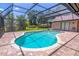 Relaxing screened-in pool with plenty of patio space, ideal for enjoying sunny days at home at 4218 Inwood Landing Dr, Orlando, FL 32812