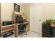 Bright home office space featuring a desk, shelving, and ample natural light at 474 Windmeadows St # 0, Altamonte Springs, FL 32701