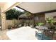 A brick-paved patio filled with potted plants, providing a serene and private outdoor space at 474 Windmeadows St # 0, Altamonte Springs, FL 32701