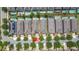 An aerial view displays residential homes with neat landscaping and sidewalks lining the streets in this community at 480 Lasso Dr, Kissimmee, FL 34747
