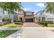 Charming two-story home featuring a brick-paved driveway, a two-car garage and beautiful landscaping at 480 Lasso Dr, Kissimmee, FL 34747