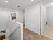Bright hallway features neutral walls, carpet floors and access to bedrooms and bathrooms at 480 Lasso Dr, Kissimmee, FL 34747