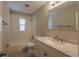 This bathroom features a vanity, a tile backsplash and a bathtub with shower at 4827 Elese St, Orlando, FL 32811