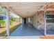 Attached carport offering covered parking and direct access to the home's entrance at 4827 Elese St, Orlando, FL 32811