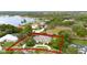 Aerial view of the property highlighting its location with mature trees and a large yard at 5025 Down Point Ln, Windermere, FL 34786