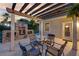 Charming outdoor fireplace with seating area, creating a cozy space for gatherings and relaxation at 5025 Down Point Ln, Windermere, FL 34786