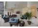 Spacious covered patio features comfortable seating, an outdoor bar, and a large screen TV at 5025 Down Point Ln, Windermere, FL 34786