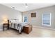 Comfortable bedroom with two windows, ceiling fan and wood-look flooring at 516 Brett Ct, Orlando, FL 32828