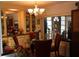 Cozy dining area with a glass table, comfortable chairs, and plenty of natural light at 518 W Plantation Blvd, Lake Mary, FL 32746