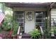 Charming front entrance with decorative wreath and greenery, creating a welcoming feel at 518 W Plantation Blvd, Lake Mary, FL 32746