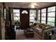 Cozy living room with natural light, comfortable seating, and a view of the outdoors at 518 W Plantation Blvd, Lake Mary, FL 32746
