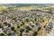 See real estate opportunities with this aerial view of a neighborhood featuring some trees and a green pin at 520 Stonewall Ave, Haines City, FL 33844