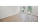 Bright bedroom featuring ample space and natural light from the arched windows at 520 Stonewall Ave, Haines City, FL 33844