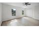 Spacious bedroom featuring two windows, double closet and ceiling fan at 520 Stonewall Ave, Haines City, FL 33844