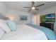 Relaxing bedroom featuring a cozy bed with soft pillows and a modern dresser at 5226 Northern Flicker Dr, St Cloud, FL 34771