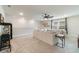 Spacious bonus room with neutral colored furniture, plush carpet, and an overhead ceiling fan at 5226 Northern Flicker Dr, St Cloud, FL 34771