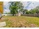 Large backyard with shed and partial fence at 5822 Flori Ln, Orlando, FL 32808