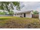 Home with an expansive backyard and access doors at 5822 Flori Ln, Orlando, FL 32808