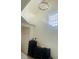 Cozy bedroom featuring a high ceiling and a modern light fixture at 601 Blackstone Ave, Deltona, FL 32725