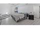 Comfortable bedroom with modern flooring and a cozy bed at 601 Blackstone Ave, Deltona, FL 32725