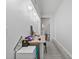 Bright office space with ample lighting and a view of the bathroom at 601 Blackstone Ave, Deltona, FL 32725