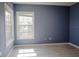 Bedroom featuring wood-look floors and natural light from a window at 6512 Swissco Dr # 1428, Orlando, FL 32822